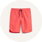 A pair of bright coral swim trunks.