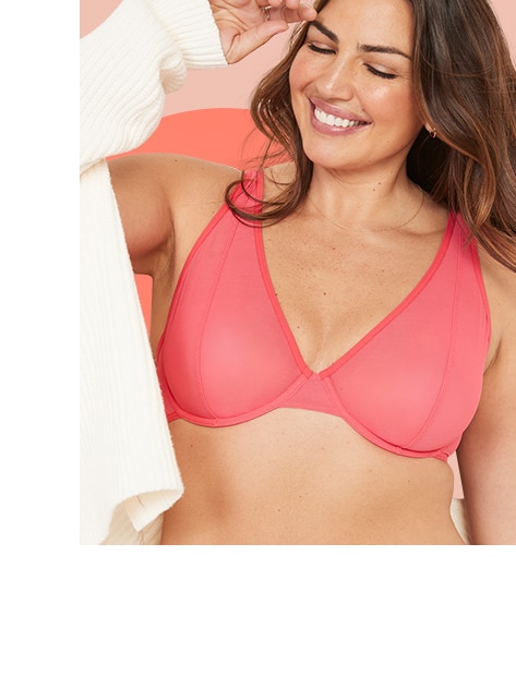 A female model wearing a dark pink mesh unlined underwire plunge bra