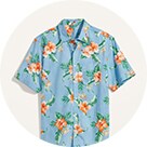 Image of a short sleeve button-up tropical print shirt.
