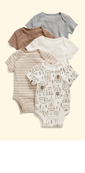 A layout of five neutral bodysuits.