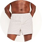 On-figure image of off-white colored men's woven boxer style underwear