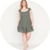 Image displays shoulder length sleeve fit&flare green cami mini dress.