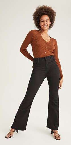 High waisted black jeans with leg flare.