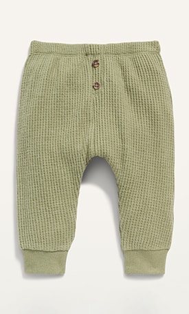 Image features green knit pants.