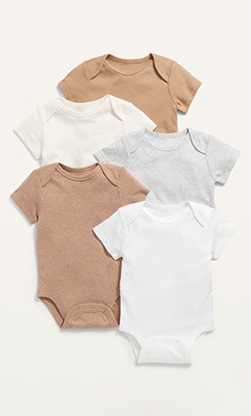 Image displays short-sleeve bodysuits in a variety of neutral colors.