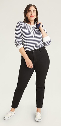 Solid black skinny jeans, mid-rise.