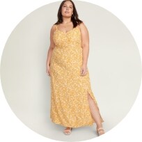 Female model wearing yellow floral print maxi slip dress for women.