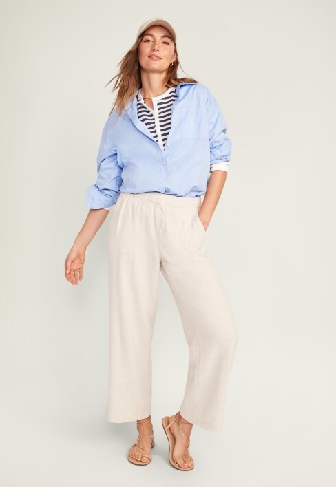 A model in a pair of light colored Linen Wide Leg pants