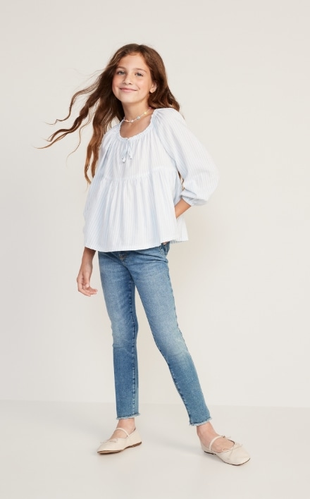 Little Girl In Jeans Pointing Forward Stock Photo, Picture and Royalty Free  Image. Image 9180548.