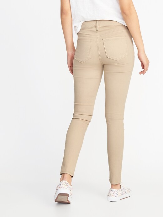 View large product image 2 of 3. Mid-Rise Beige Super Skinny Rockstar Jeans for Women