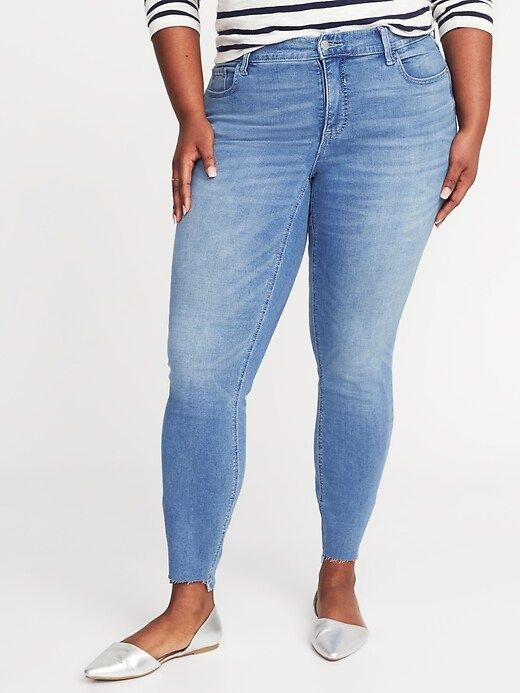 Image number 1 showing, High-Rise Secret-Slim Pockets Plus-Size Rockstar Step-Hem Jeans