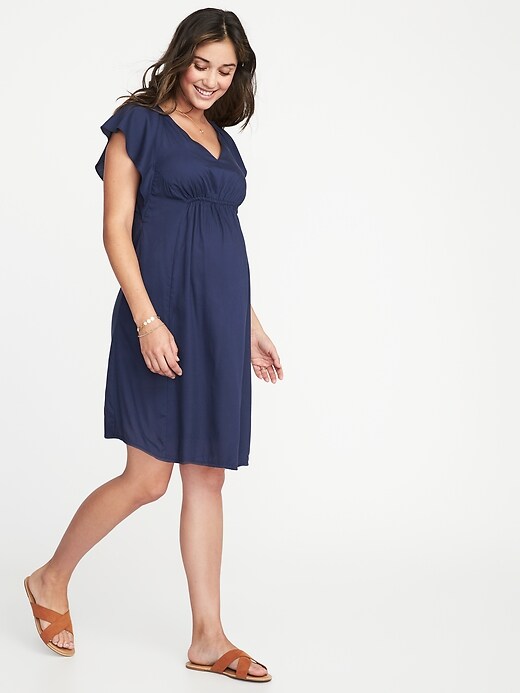 View large product image 1 of 1. Maternity Sleeveless Ruffle-Trim Shift Dress