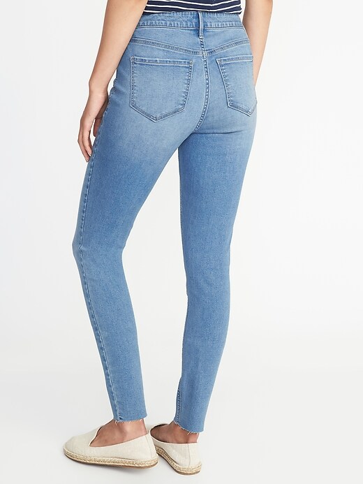 View large product image 2 of 2. Mid-Rise Rockstar Super Skinny Raw-Edge Ankle Jeans for Women