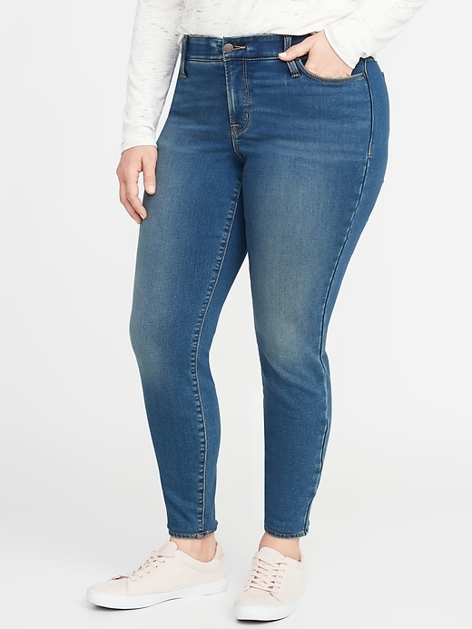 Image number 1 showing, High-Waisted Secret-Slim Pockets + Waistband Built-In Warm Rockstar Super Skinny Plus-Size Jeans