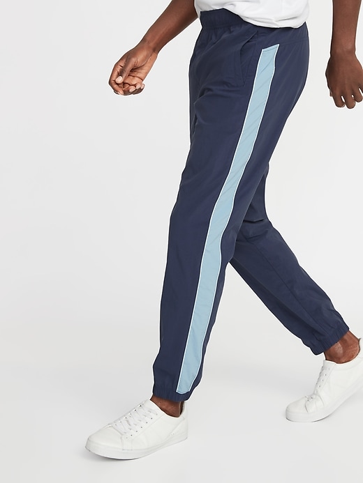 View large product image 1 of 1. Go-H20 Water-Repellent Color-Block Track Pants
