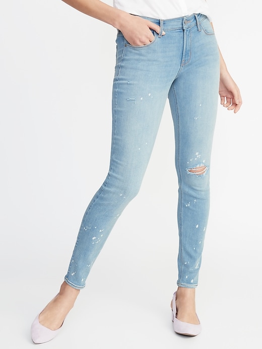 View large product image 1 of 3. Mid-Rise Distressed Bleach-Spot Rockstar Super Skinny Jeans for Women