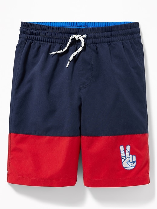 View large product image 1 of 2. Color-Blocked Embroidered-Graphic Swim Trunks For Boys