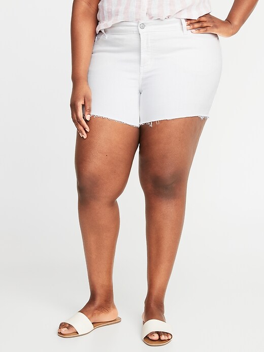 Image number 1 showing, High-Waisted Secret-Slim Pockets Plus-Size White Jean Cut-Off Shorts - 5-Inch inseam