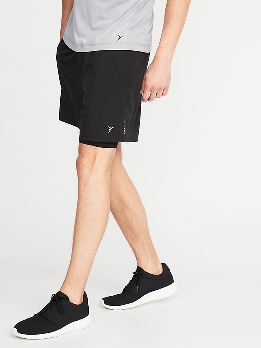 View large product image 1 of 3. 2-in-1 Go-Dry 4-Way Stretch Run Shorts - 7-inch inseam