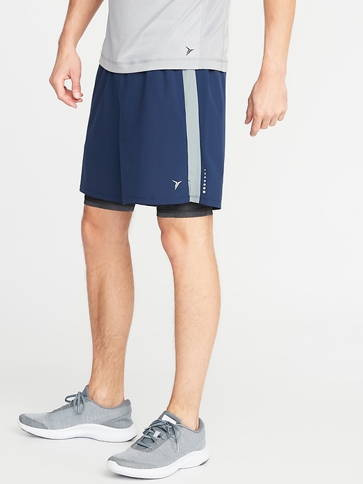 View large product image 1 of 1. 2-in-1 Go-Dry 4-Way Stretch Run Shorts - 7-inch inseam