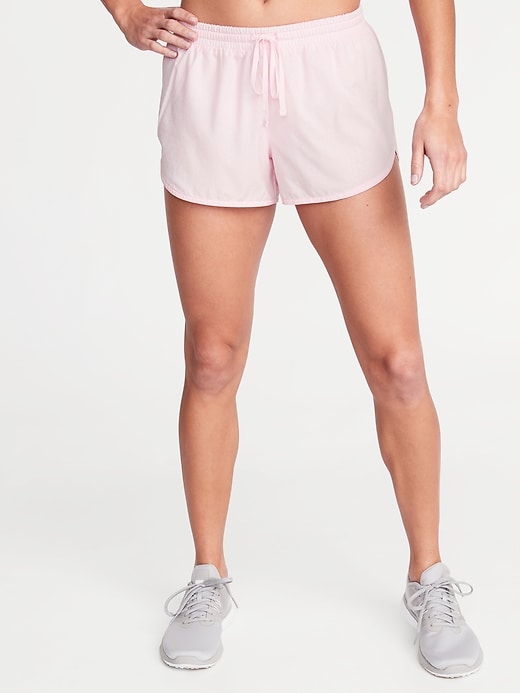 View large product image 1 of 1. Mid-Rise Dolphin-Hem Run Shorts for Women -- 3-inch inseam