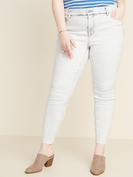 Image number 1 showing, High-Waisted Secret-Slim Pockets + Waistband Plus-Size Rockstar Super Skinny Frayed-Hem Jeans