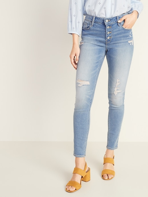 Image number 1 showing, Mid-Rise Button-Fly Distressed Rockstar Super Skinny Jeans for Women
