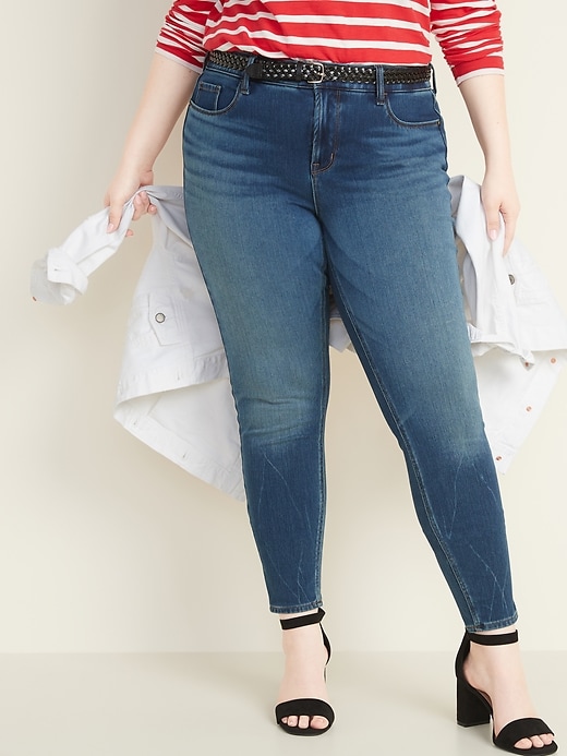 Image number 1 showing, High-Waisted Secret-Smooth Pockets + Waistband Rockstar 24/7 Sculpt Plus-Size Super Skinny Jeans