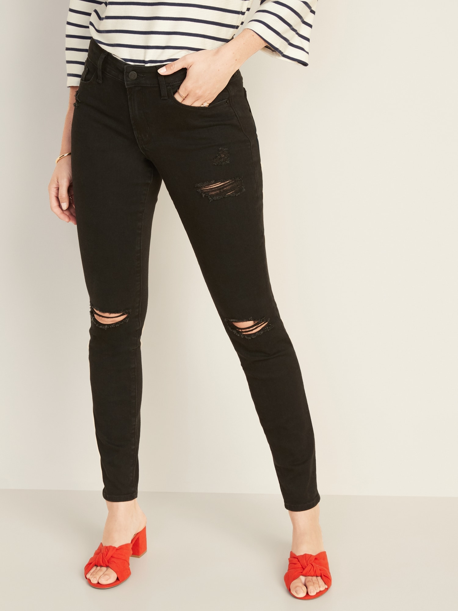 mid rise black ripped jeans