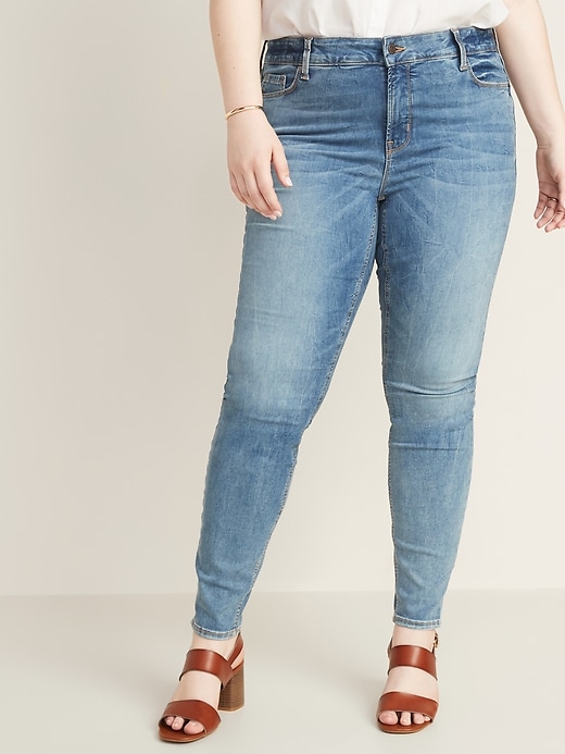 Image number 1 showing, High-Waisted Secret-Slim Pockets Built-In Sculpt Rockstar Plus-Size Super Skinny Jeans