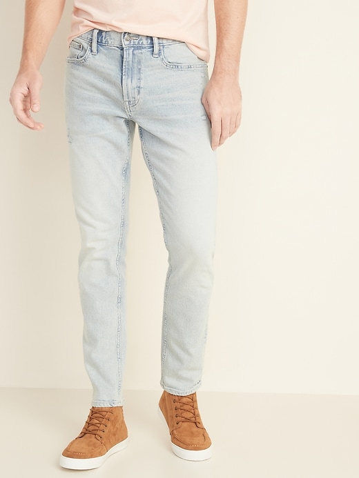 View large product image 1 of 2. Relaxed Slim Built-In Flex Distressed Light-Wash Jeans