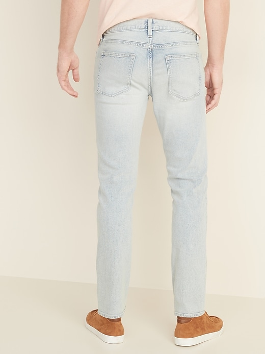 View large product image 2 of 2. Relaxed Slim Built-In Flex Distressed Light-Wash Jeans