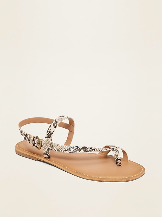 View large product image 1 of 1. Faux-Leather Asymmetric Cross-Strap Sandals