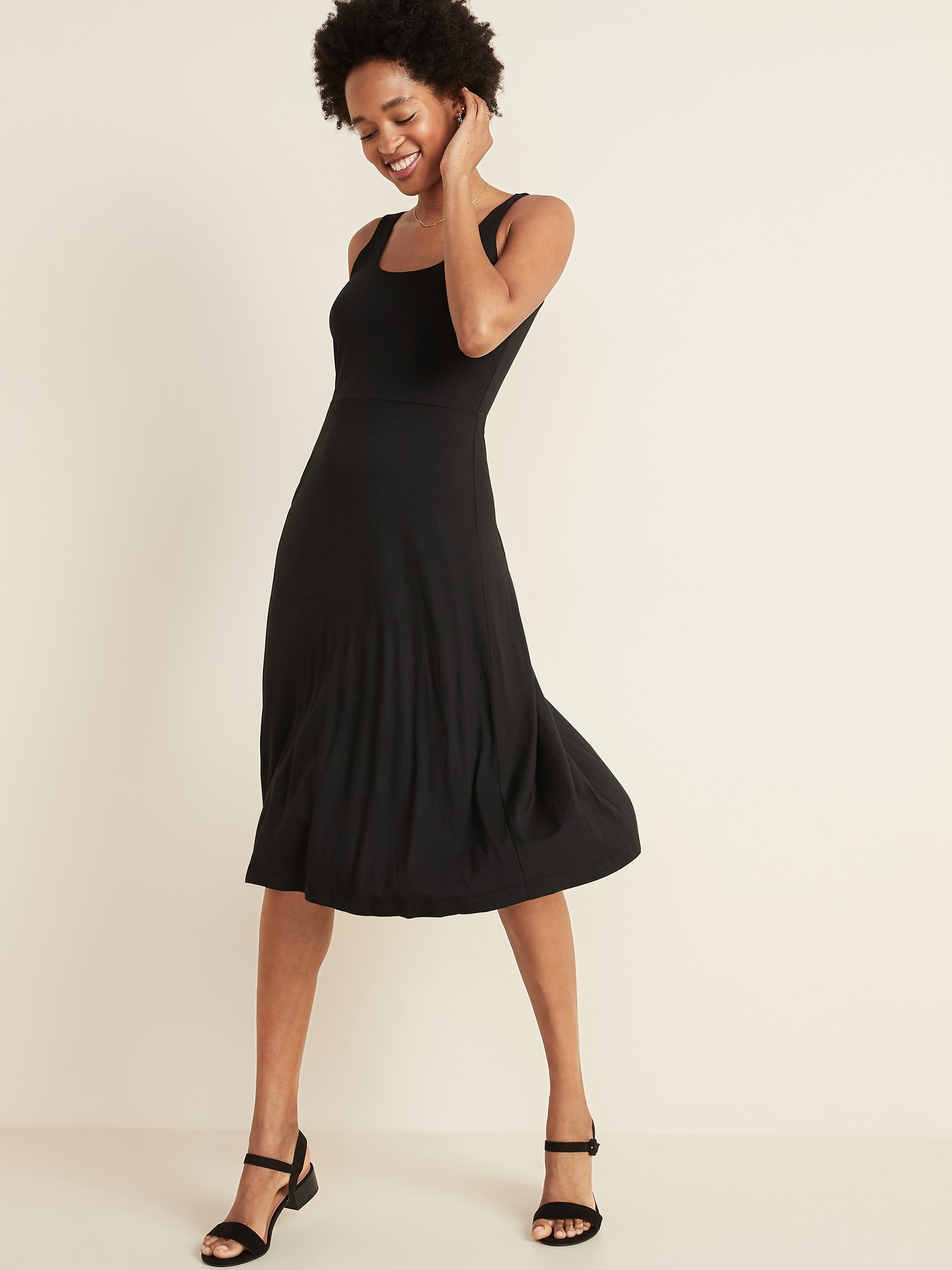 black sleeveless fit and flare dress