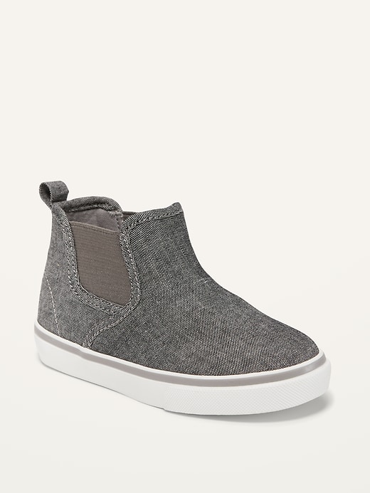 View large product image 1 of 4. Unisex Chambray Mid-Top Slip-On Sneakers for Toddler