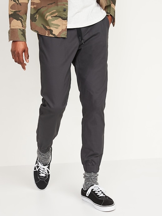 View large product image 1 of 2. Slim Ultimate Tech Chino Jogger Pants