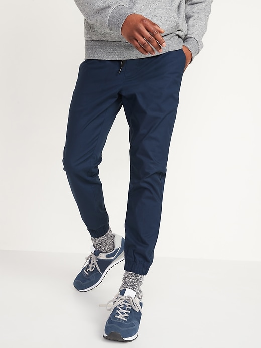 View large product image 1 of 2. Slim Ultimate Tech Chino Jogger Pants