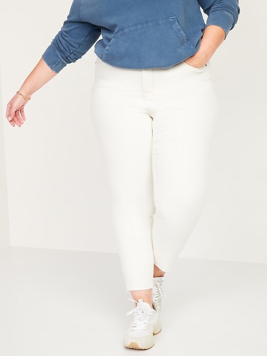 Image number 1 showing, Extra High-Waisted Secret-Smooth Pockets Rockstar 360° Stretch Plus-Size Super Skinny Cut-Off Jeans