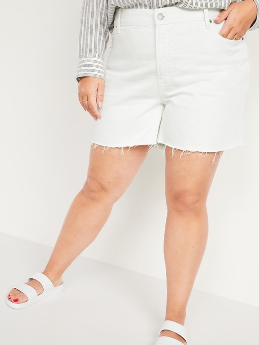 Image number 1 showing, High-Waisted Secret-Slim Pockets Slouchy Plus-Size White Cut-Off Jean Shorts -- 5-inch inseam