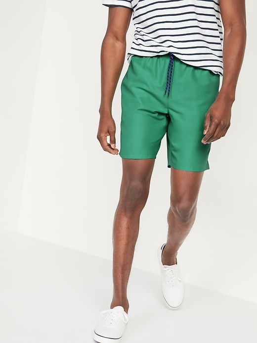 View large product image 1 of 2. Solid-Color Swim Trunks -- 8-inch inseam