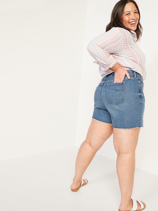 Image number 2 showing, High-Waisted Secret-Slim Pockets Slouchy Plus-Size Cut-Off Jean Shorts- 5-inch inseam