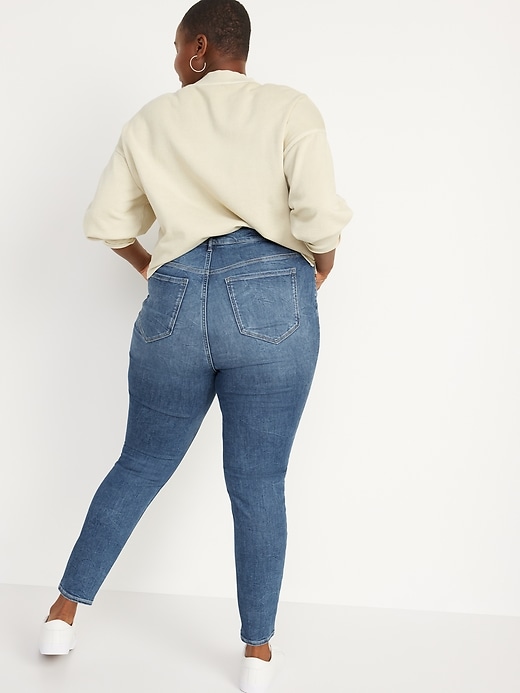 Image number 8 showing, FitsYou 3-Sizes-in-1 Extra High-Waisted Rockstar Super-Skinny Jeans