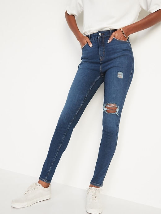 Image number 1 showing, Extra High-Waisted Rockstar 360&#176 Stretch Super Skinny Ripped Jeans
