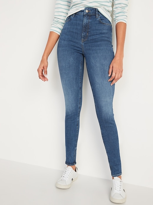 Image number 1 showing, FitsYou 3-Sizes-in-1 Extra High-Waisted Rockstar Super-Skinny Jeans for Women