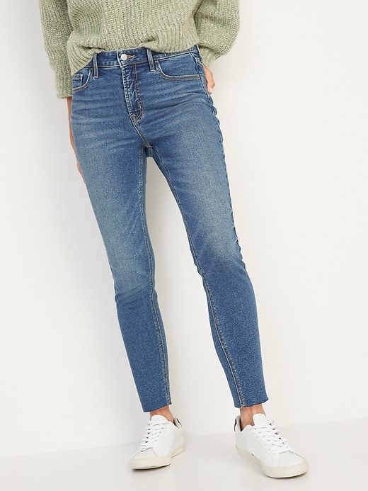Image number 1 showing, High-Waisted Rockstar Super-Skinny Cut-Off Ankle Jeans