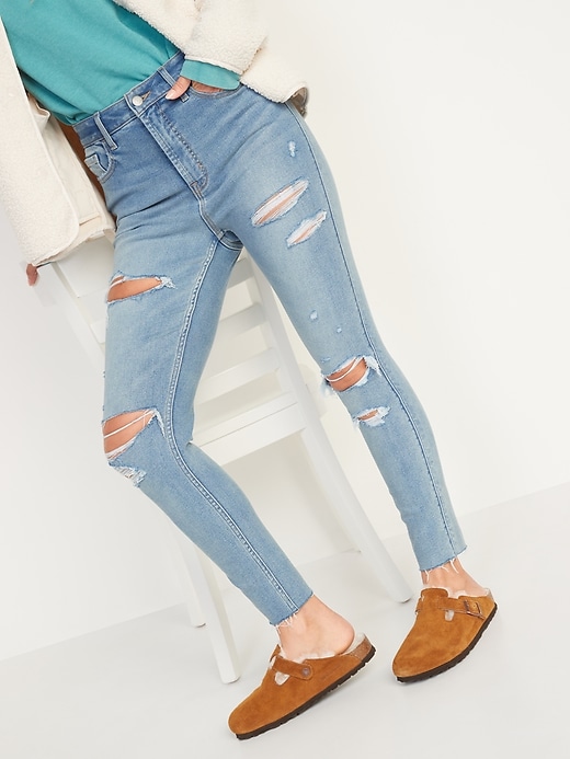 Image number 1 showing, Extra High-Waisted Rockstar 360° Stretch Super-Skinny Ripped Ankle Jeans for Women