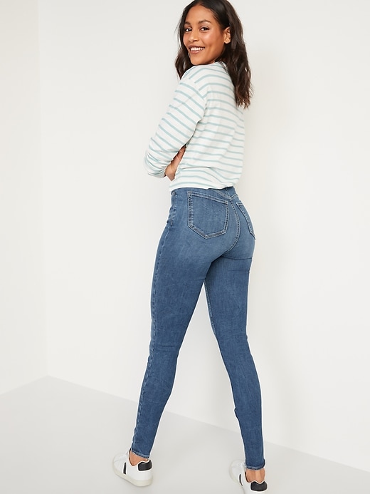 Image number 2 showing, FitsYou 3-Sizes-in-1 Extra High-Waisted Rockstar Super-Skinny Jeans for Women