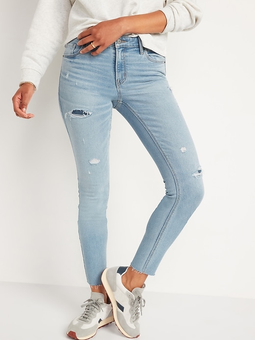 Image number 1 showing, Mid-Rise Rockstar Super Skinny Ripped Jeans for Women