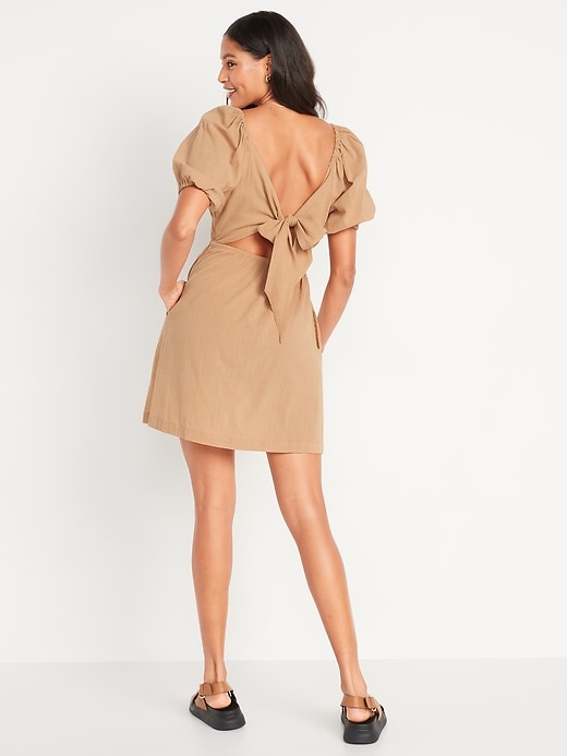 Image number 2 showing, Puff-Sleeve Tie-Back Cut-Out Mini Swing Dress