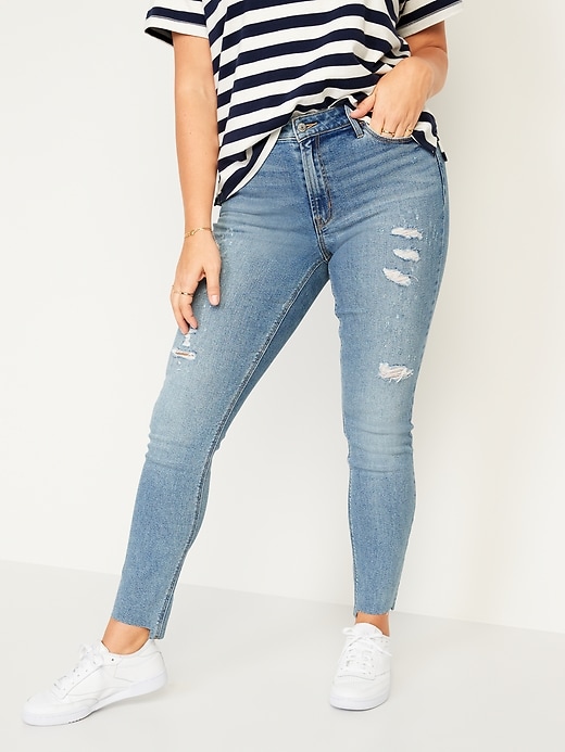 Image number 5 showing, Mid-Rise Rockstar Super-Skinny Ripped Cut-Off Ankle Jeans
